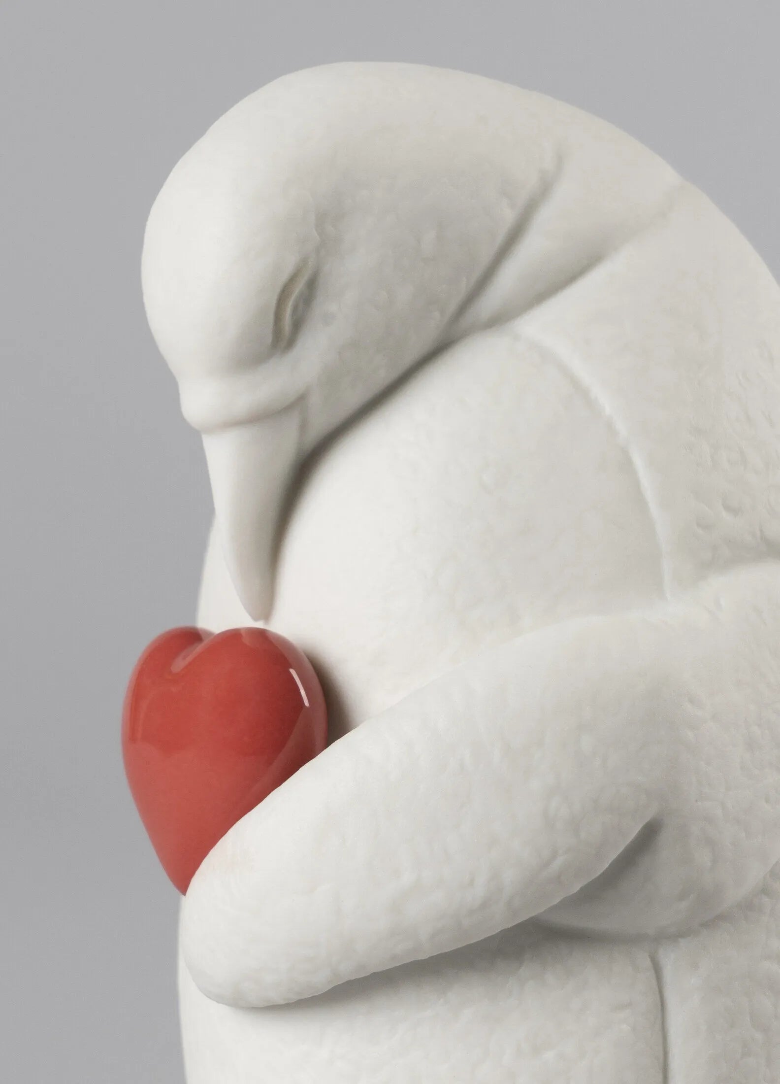 Lladro Protective Penguin - Goviers of Sidmouth